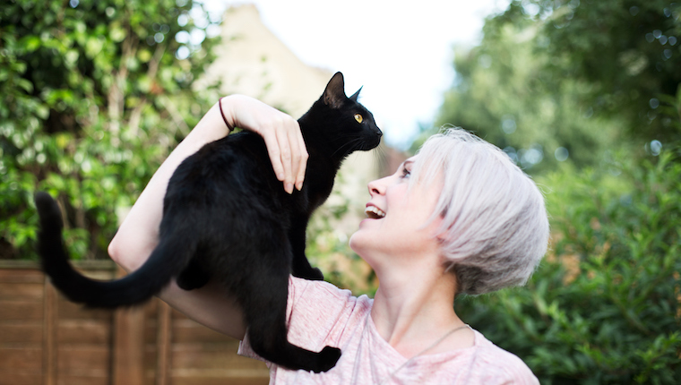 Woman holding cat